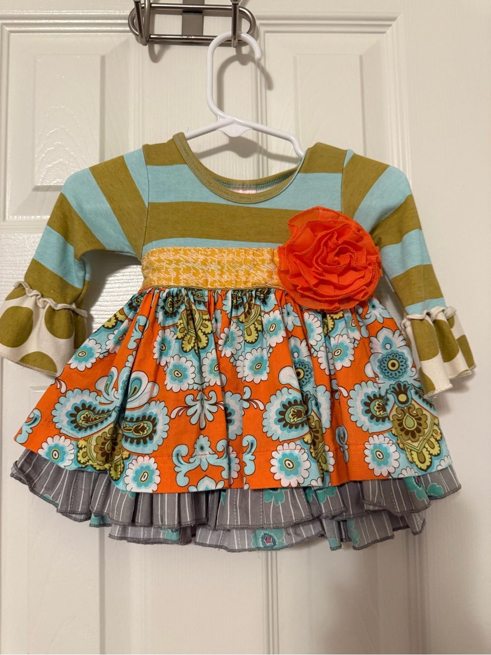 Giggle Moon -3mo-Girls Orange Floral Tiered Tunic with Aqua Stripes and Rosette